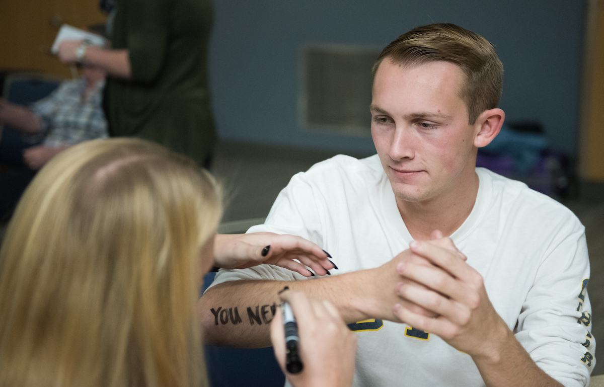 People participate in Dear World Wednesday, Nov. 15, 2017 in the University Center.