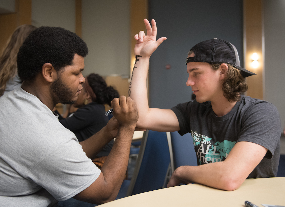 People participate in Dear World Wednesday, Nov. 15, 2017 in the University Center.