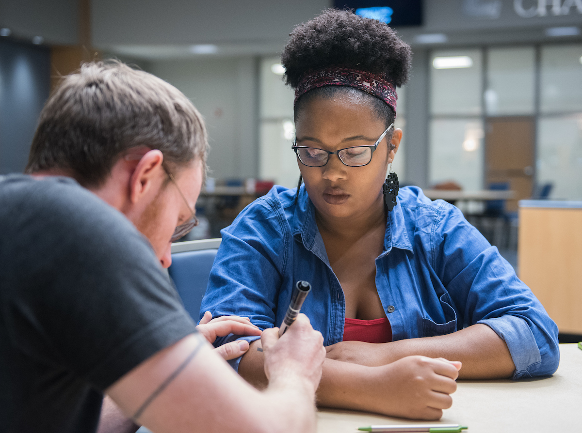 People participate in Dear World Wednesday, Nov. 15, 2017 in the University Center.