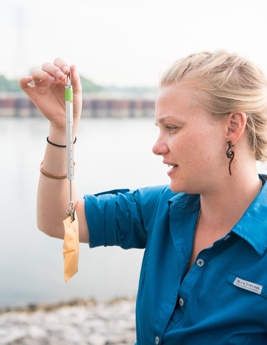 Pascale Lubbe (blue) and Sarah Whitney work Tuesday, May 15, 2018 with Dr. David Aborn on a collaborative project with the Cornell Lab of Ornithology studying tree swallows.The project involves monitoring swallow nests and taking blood samples from the birds.