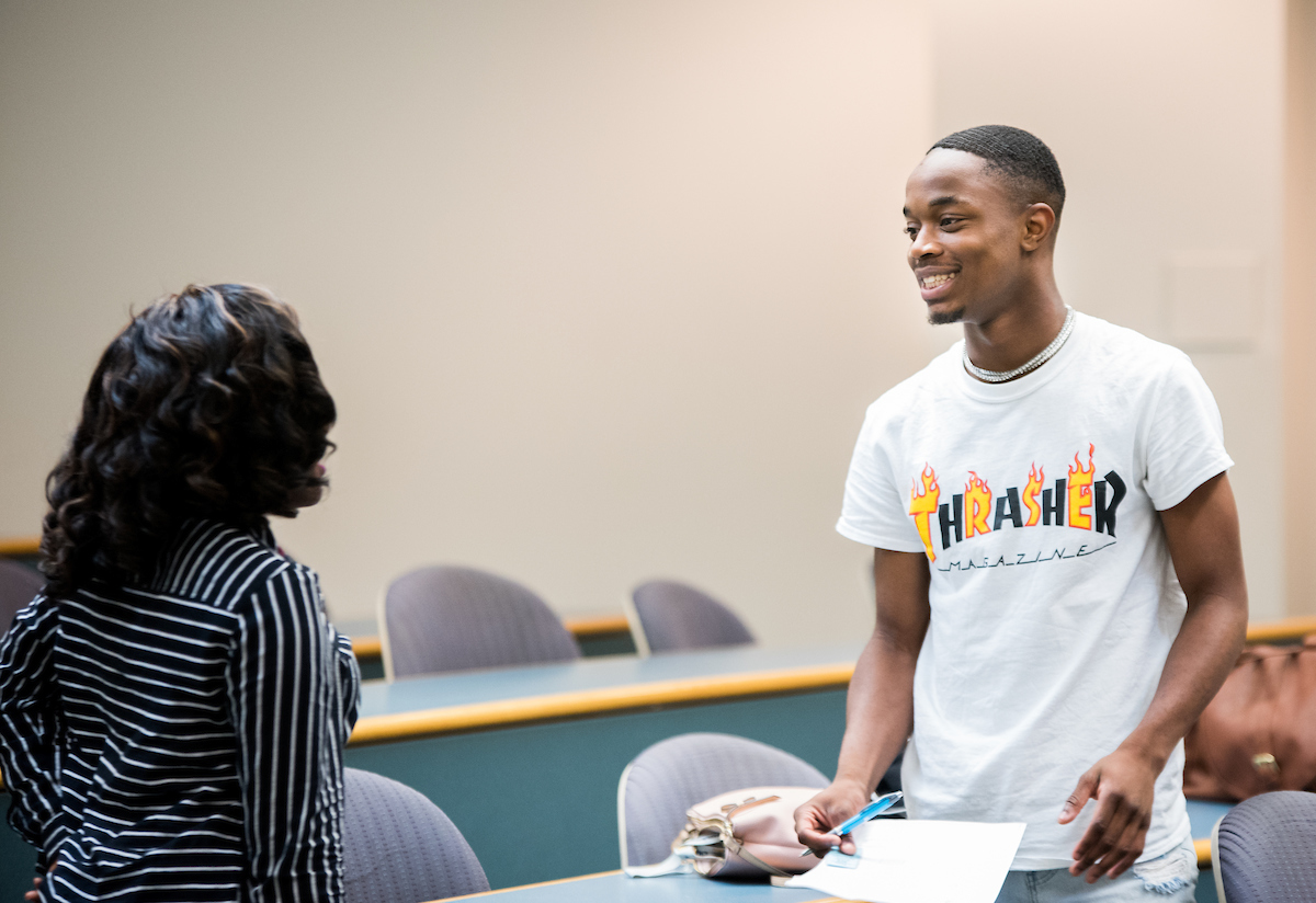 Students participate in the Commodities Exchange Game.