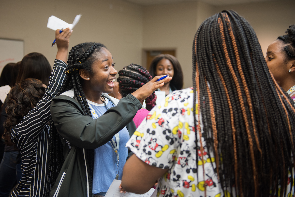 Students participate in the Commodities Exchange Game.