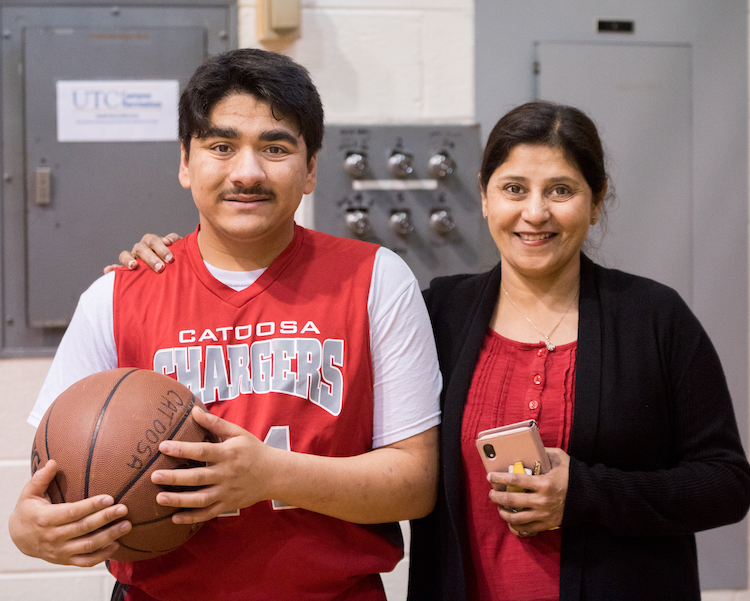 Dev Shah and his mother, Shilpa, at the Special Olympics in MacLellan Gym.