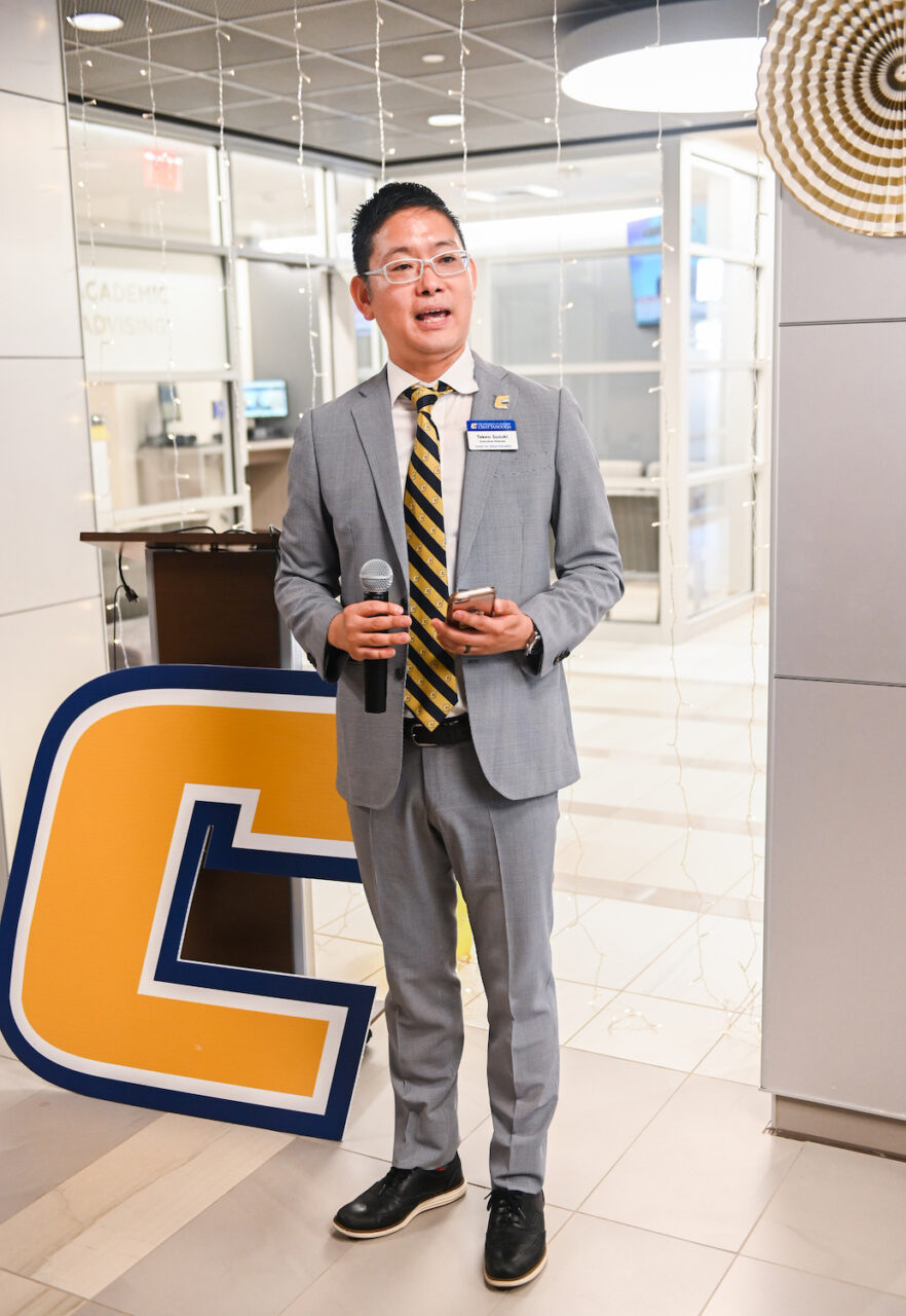 Takeo Suzuki, executive director of the Center for Global Education, welcomes SUSI students during a reception in Fletcher Hall.
