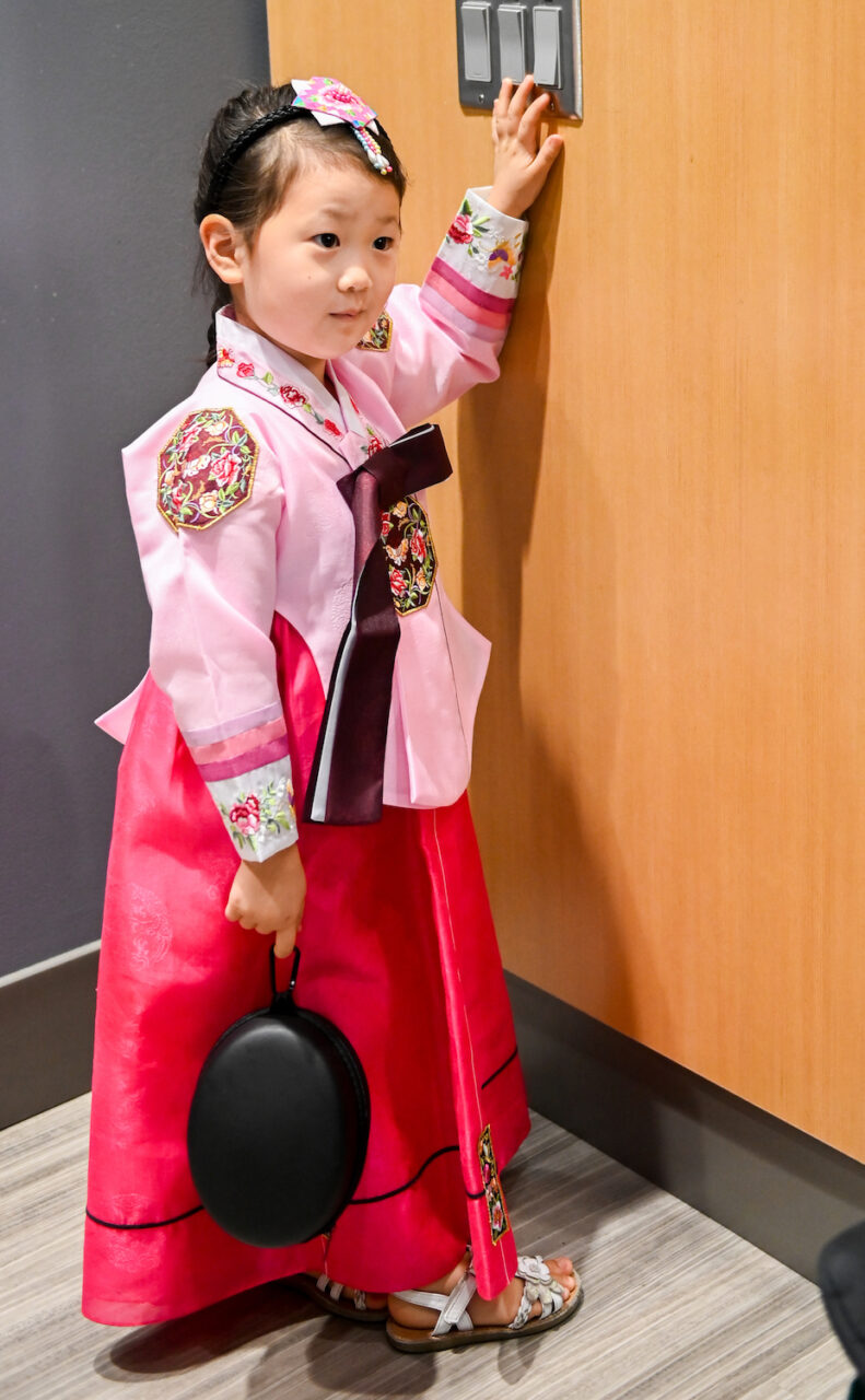 Han Park, assistant professor of chemistry, brought his daughters dressed in traditional Korean attire