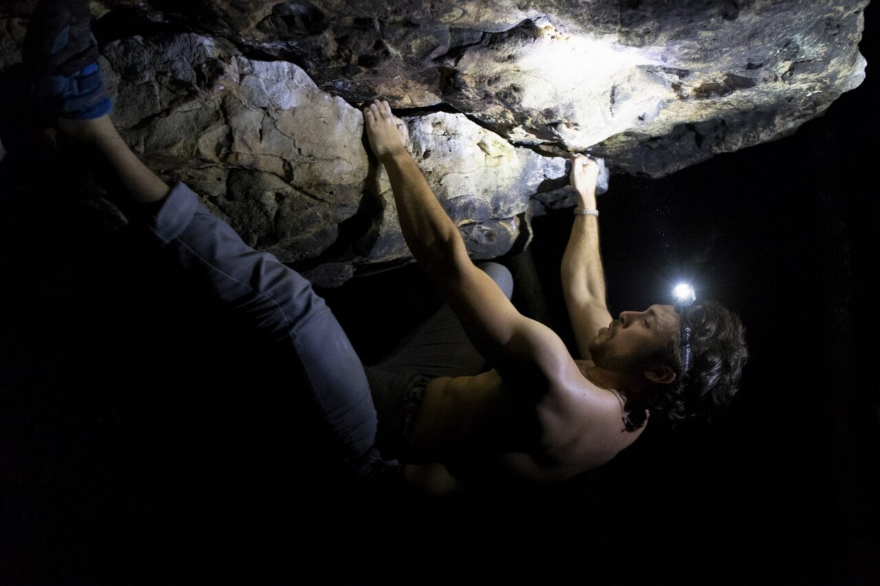 Elian Richter photo: Caleb Timmerman attempts to climb "Rustoleum" (V6) at the Upper Middle Creek boulders.