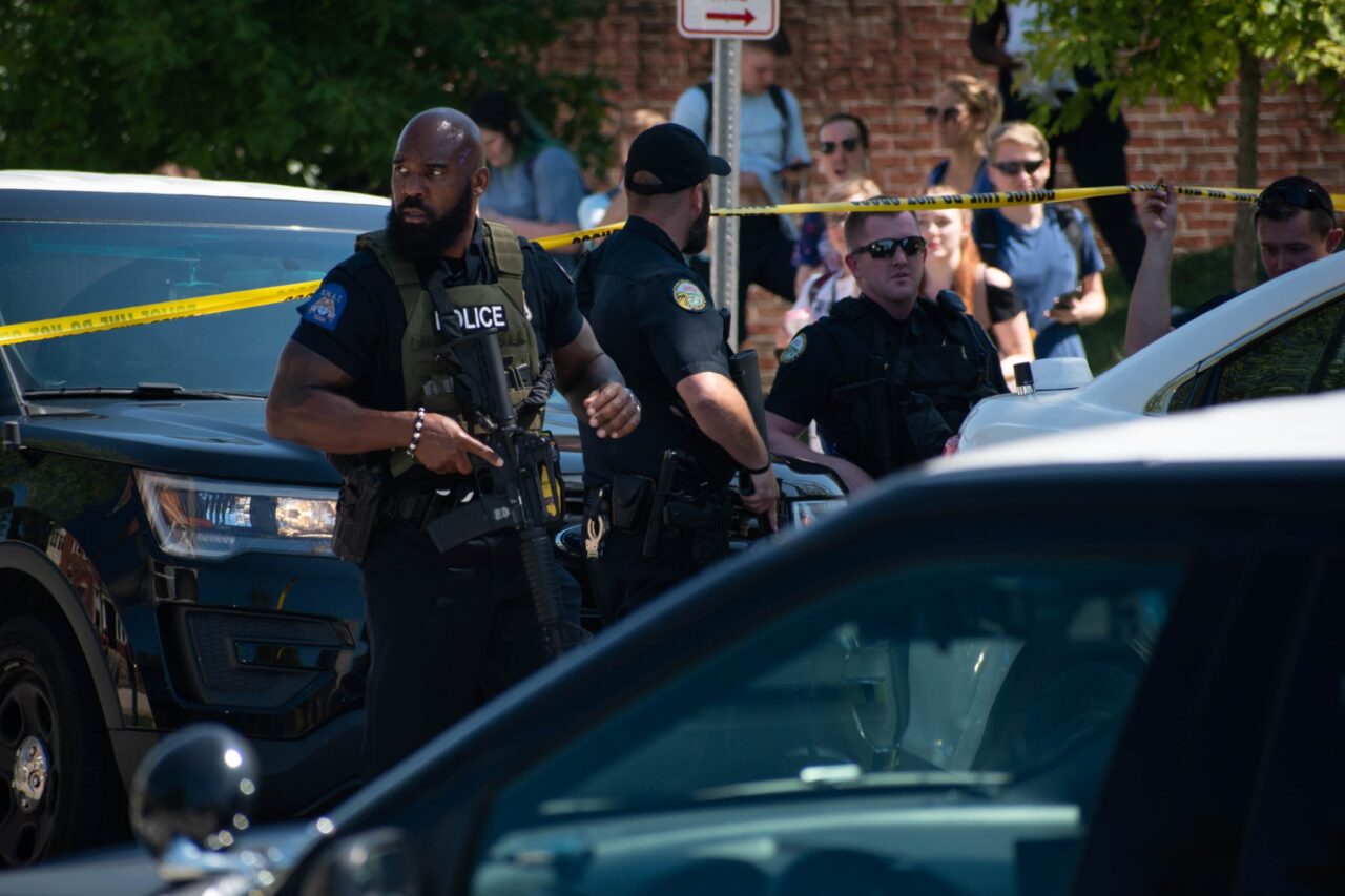 Elian Richter photo: Officers on scene at UTC while students await information outside Fletcher Hall on Aug. 28, 2019. A report of a possible shooter had been released by the Chattanooga Police Department. The report turned out to be false.