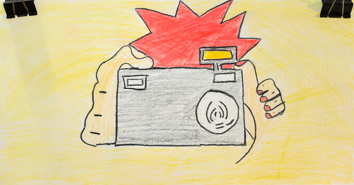 A colored pencil illustration depicts a pair of hands holding a grey camera and a red shape above the camera to resemble a flash. The background of the artwork is bright yellow.