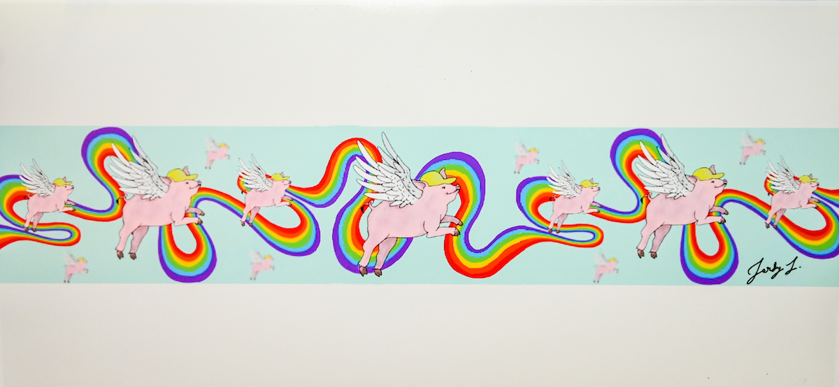 A colorful illustration shows pigs of various sizes each with wings and a baseball cap flying on a windy rainbow.