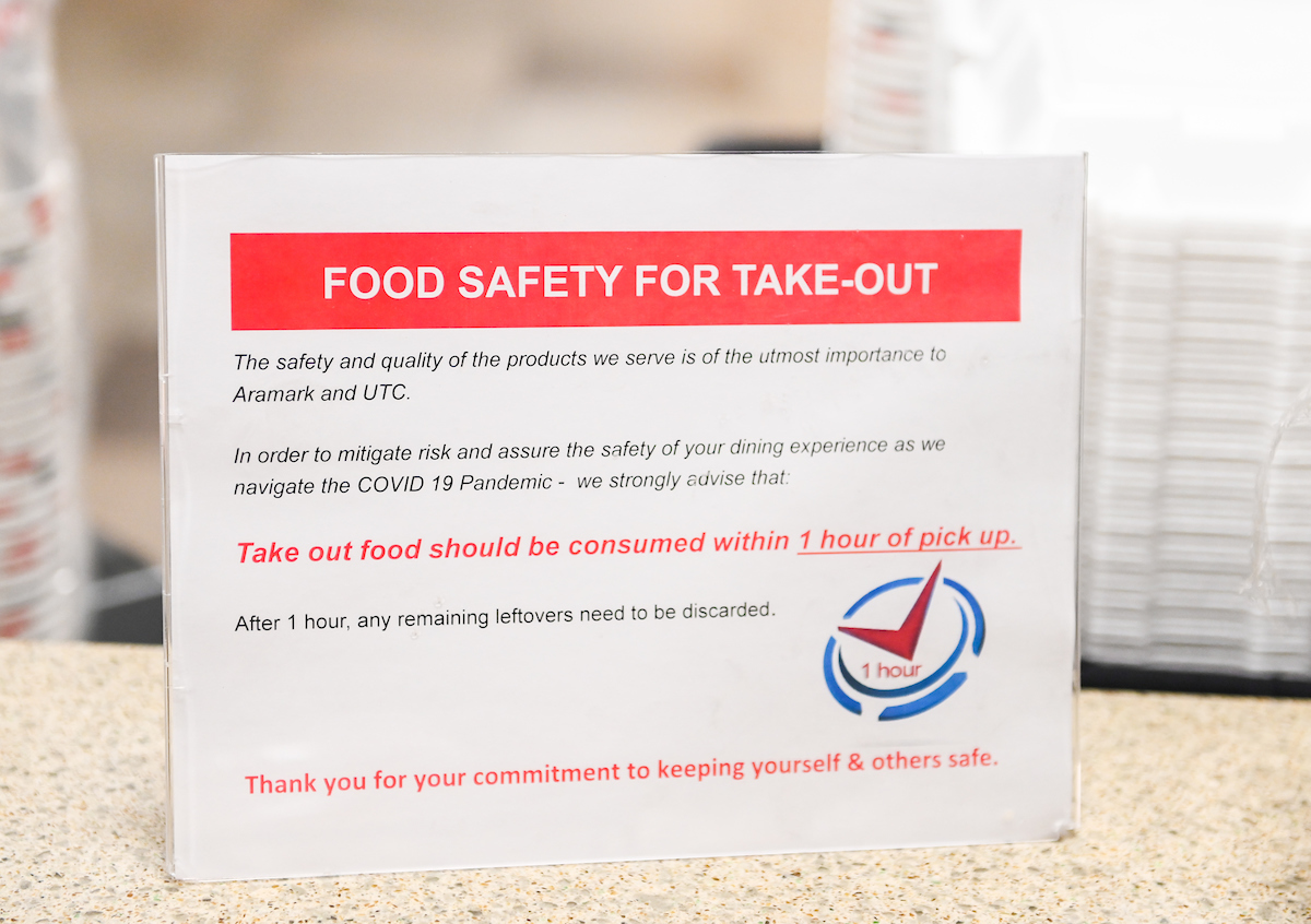 Signs about food safety have been placed around the Food Court in the University Center.