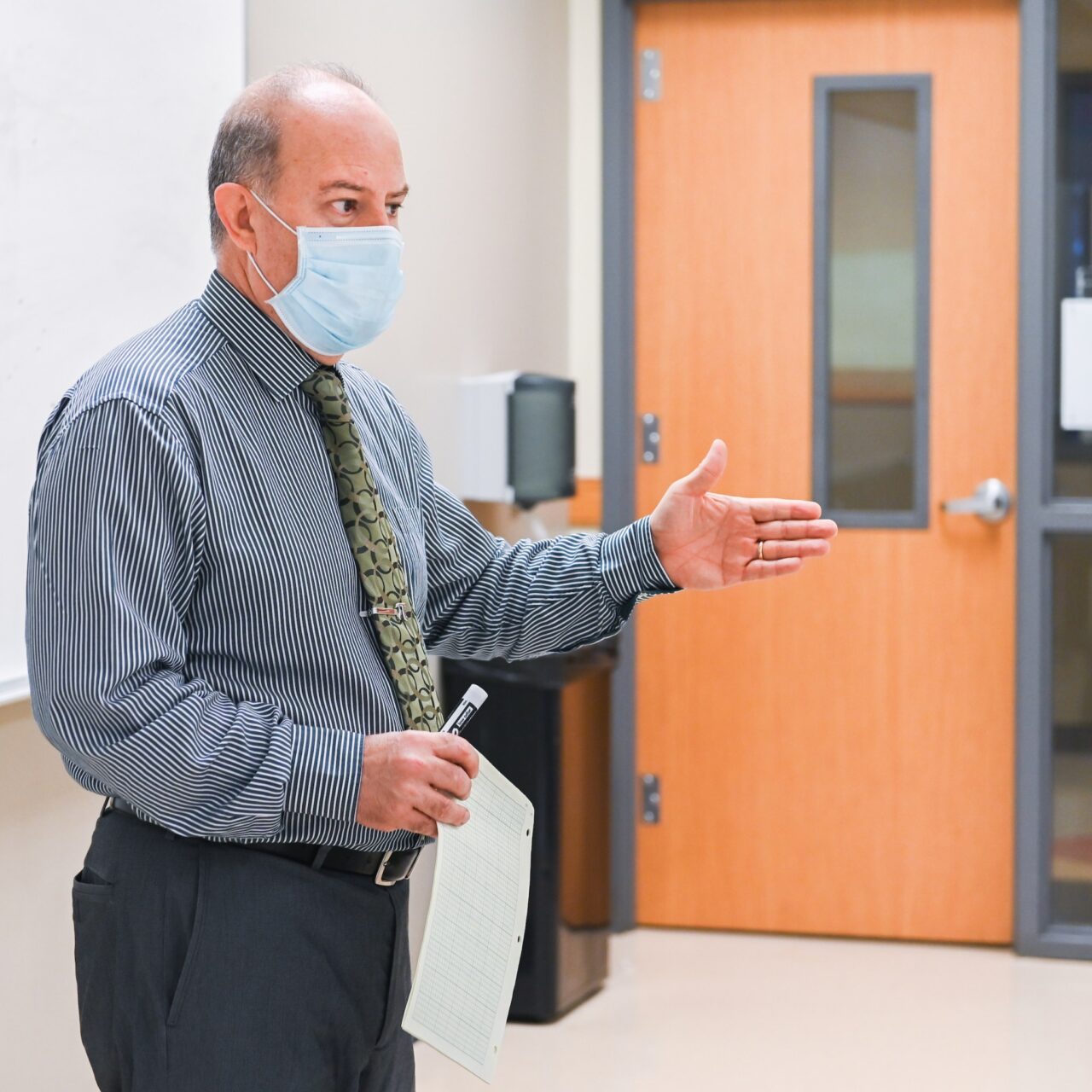 Ahad Nasab teaches a "Principles of Mechanical Systems" class in the College of Engineering and Computer Science building.