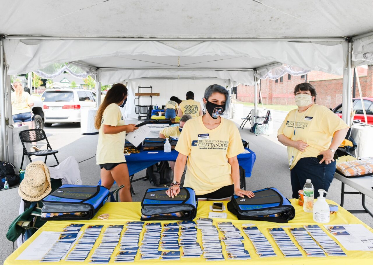 UTC staff and volunteers man the student check-in site at Engel Stadium.