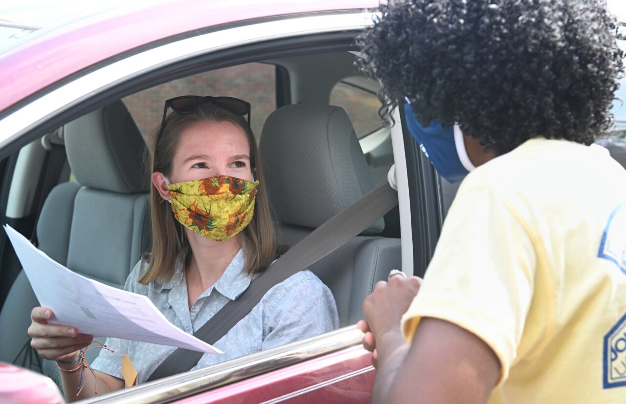 New student Laurel Pelren talks to Brittany Johnson during Operations Move In 2020.