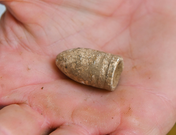 A Minie ball, the bullet of the Civil War.
