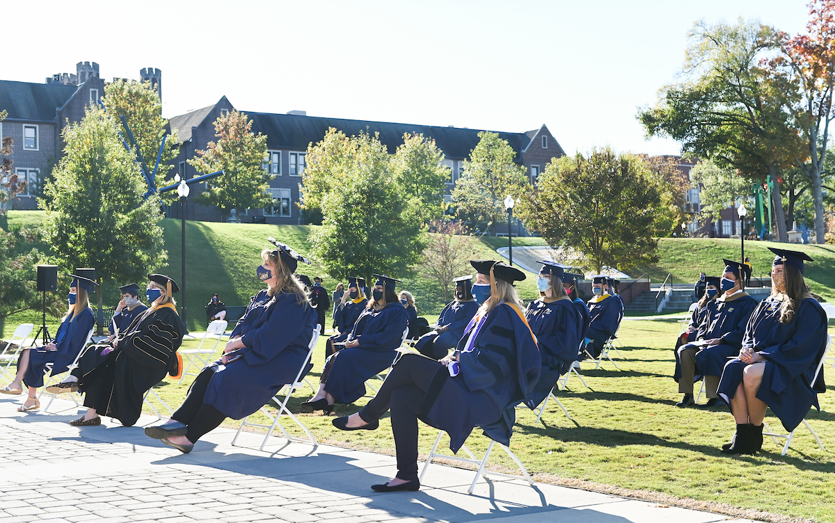 Graduate students participate in a commencement ceremony on Wednesday, Nov. 18, 2020.