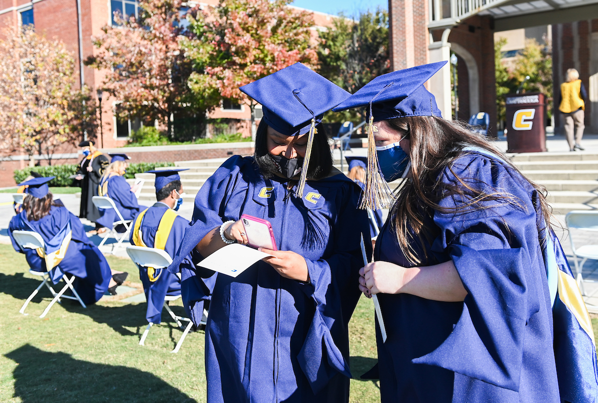 Graduate students participate in a commencement ceremony on Wednesday, Nov. 18, 2020.