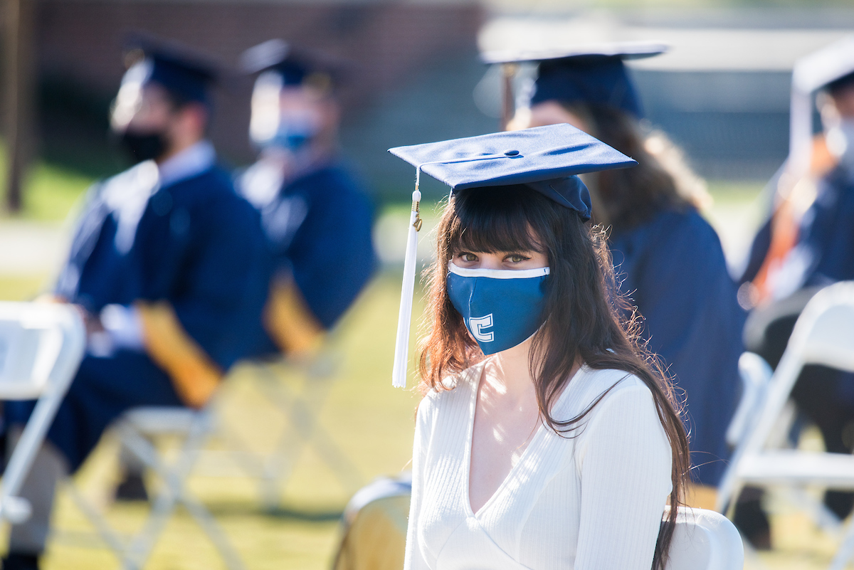 Undergraduate students participate in a commencement ceremony Thursday, Nov. 19, 2020 on Chamberlain Field.
