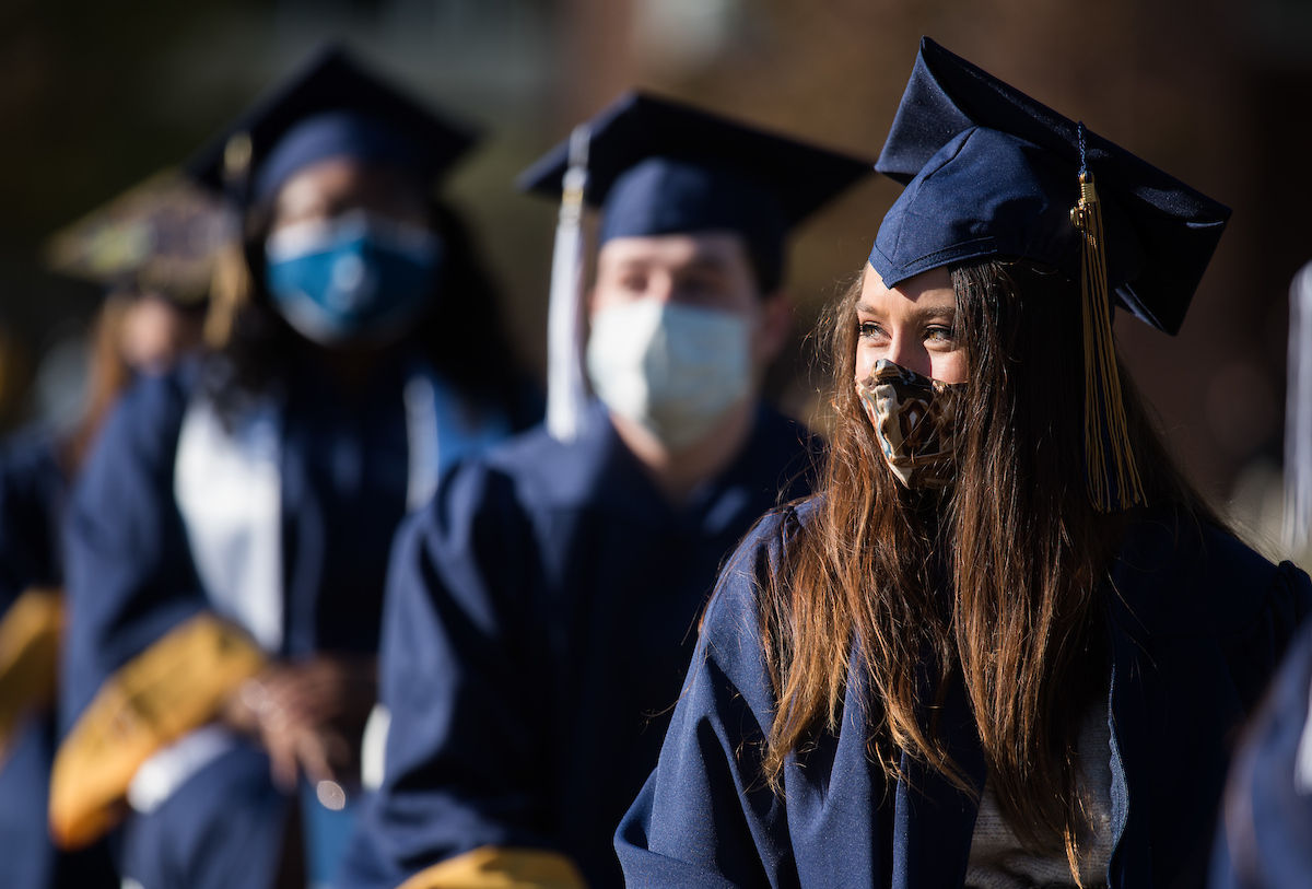 Undergraduate students participate in a commencement ceremony Thursday, Nov. 19, 2020 on Chamberlain Field.