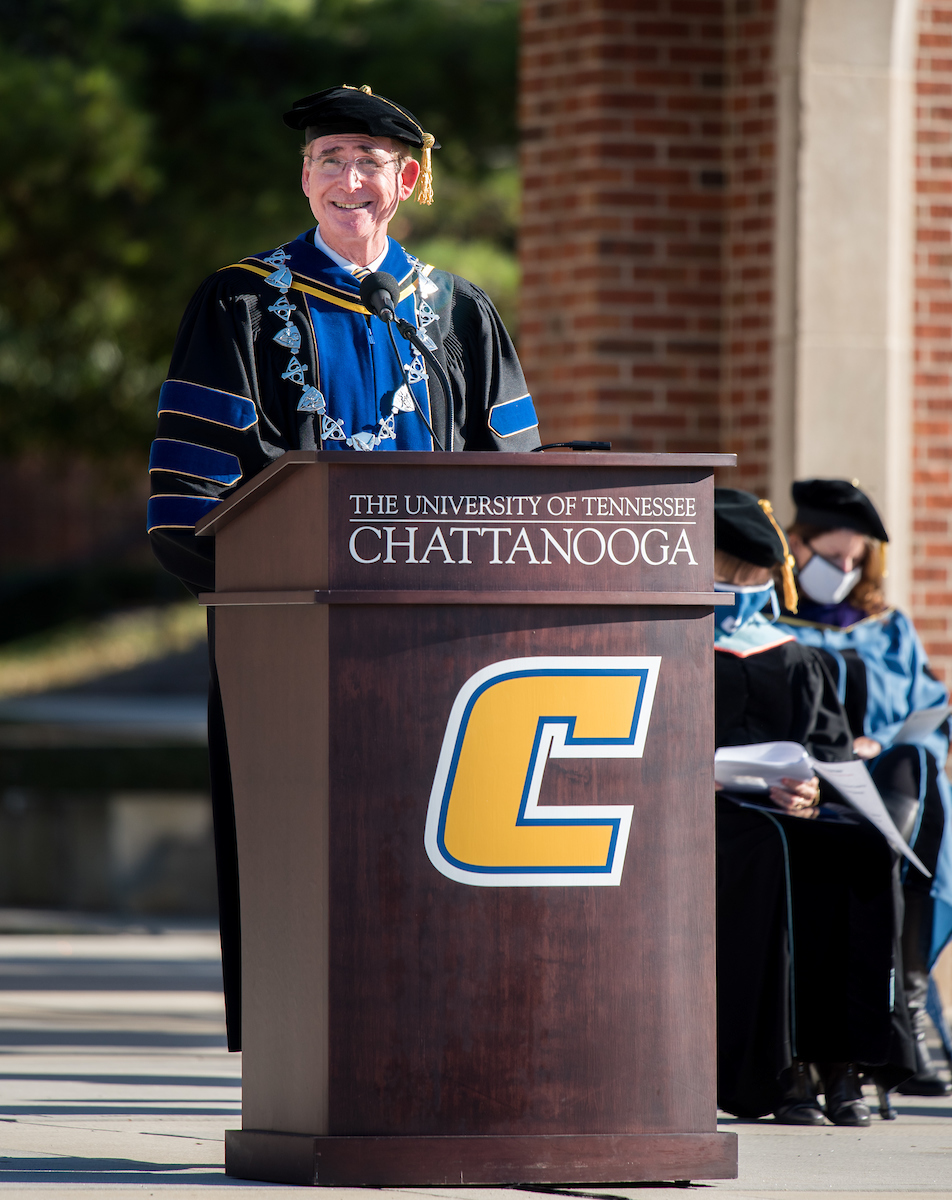 UTC Chancellor Steve Angle congratulates the graduates for their hard work.