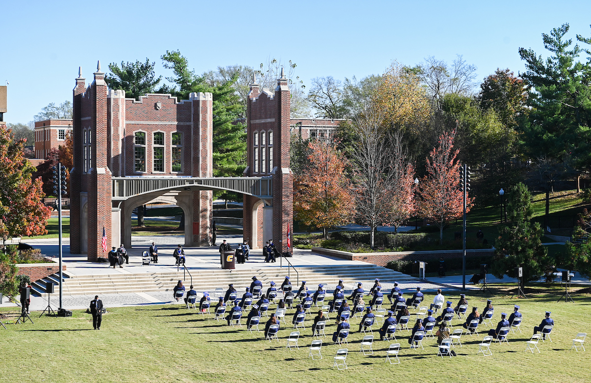 Undergraduate students participate in a commencement ceremony Thursday, Nov. 19, 2020 on Chamberlain Field.