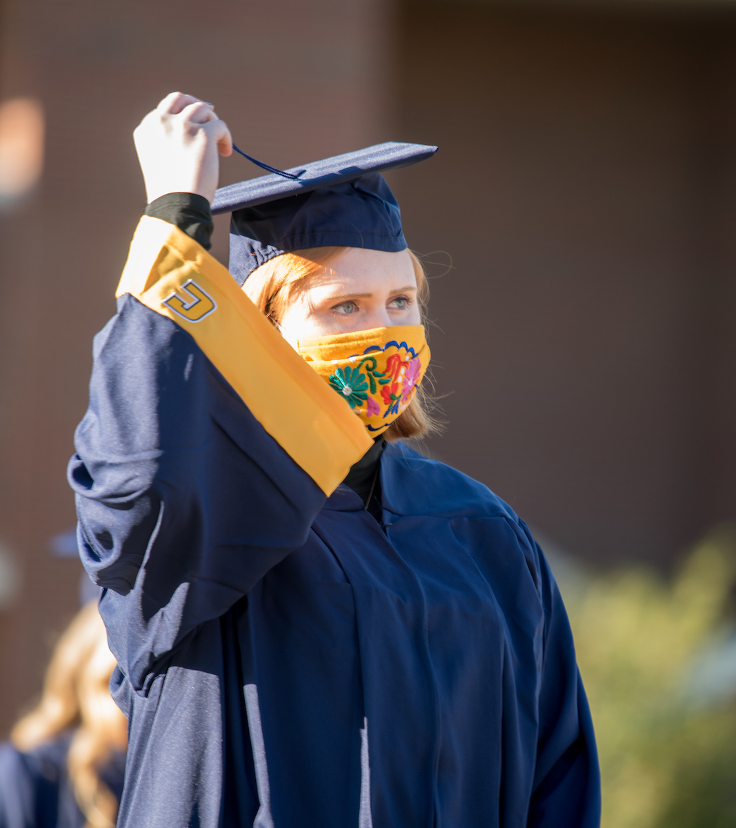 Undergraduate students participate in a commencement ceremony Thursday, Nov. 19, 2020 on Chamberlain Field.