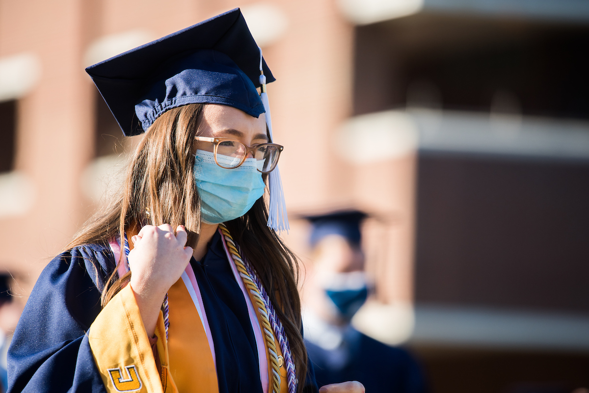 Undergraduate students participate in a commencement ceremony Thursday, Nov. 19, 2020 on Chamberlain Field.