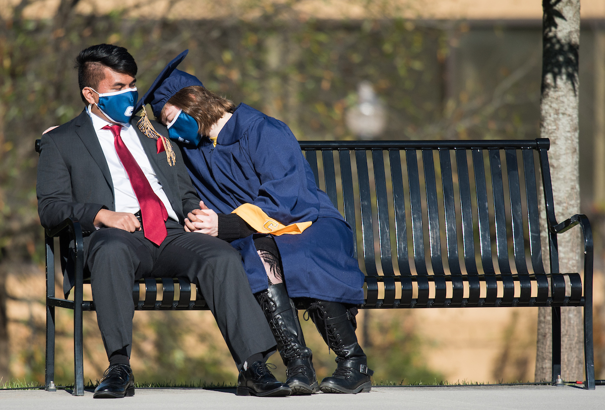 Undergraduate students participate in a commencement ceremony Thursday, Nov. 19, 2020 on Chamberlain Field.