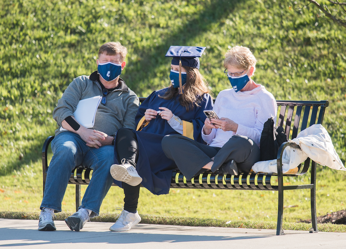 Undergraduate students participate in a commencement ceremony Thursday, Nov. 19, 2020 on Chamberlain Field.