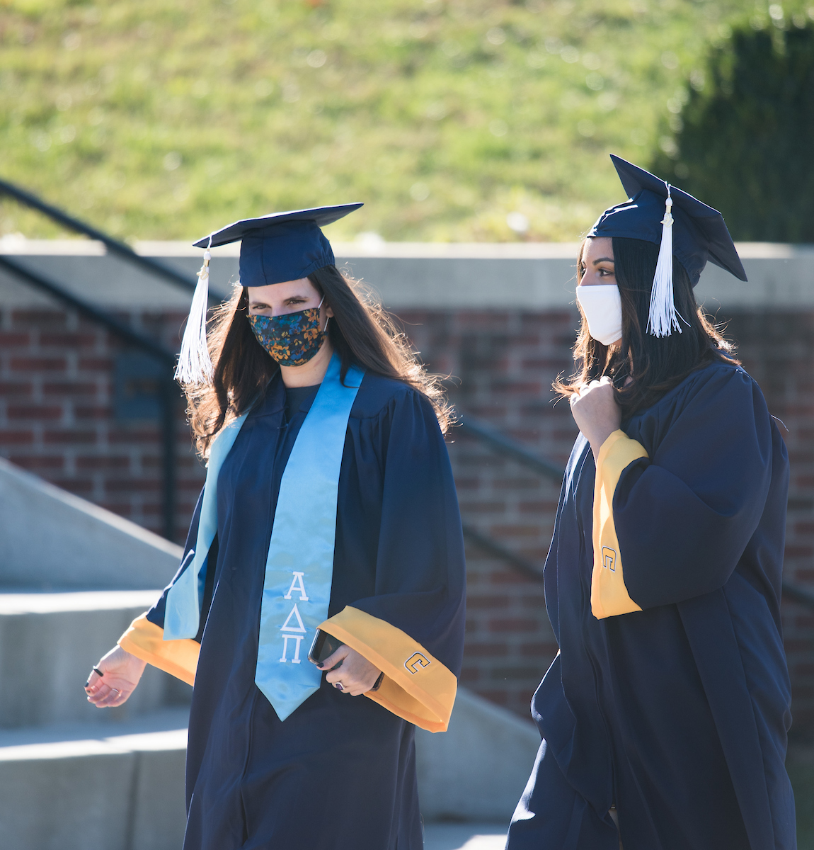 Undergraduate students participate in a commencement ceremony Thursday, Nov. 19, 2020 on Chamberlain Field.