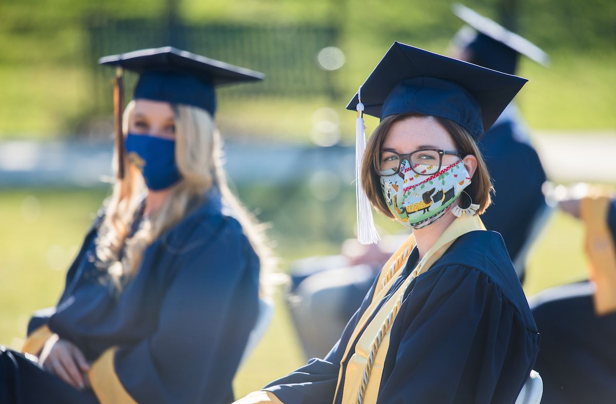 Undergraduate students participate in a commencement ceremony Thursday, Nov. 19, 2020 on Chamberlain Field.