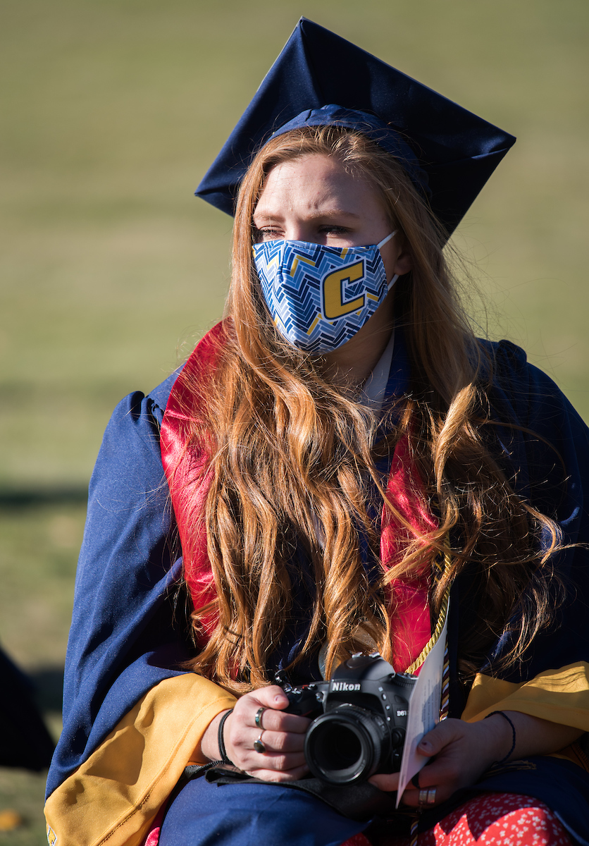 Undergraduate students participate in a commencement ceremony Thursday, Nov. 19, 2020 on Chamberlain Field.