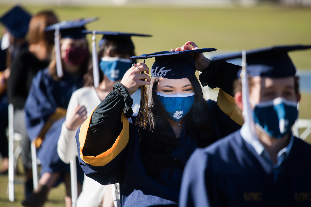 Undergraduate students participate in a commencement ceremony Thursday, Nov. 19, 2020 on Chamberlain Field.