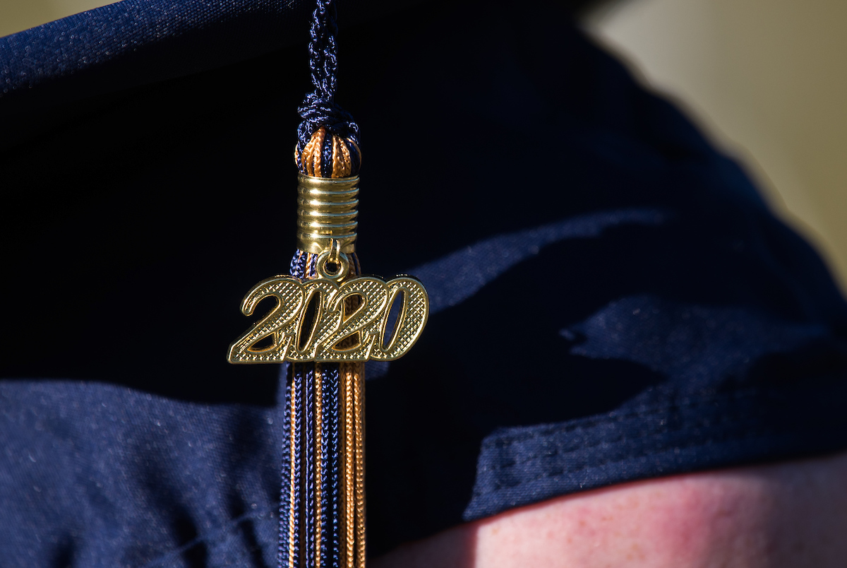 Undergraduate students participate in a commencement ceremony Thursday, Nov. 19, 2020 on Chamberlain Field.