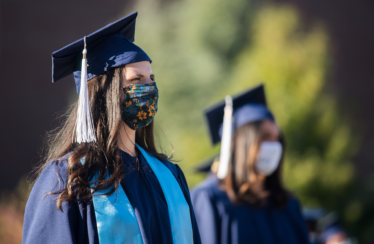Undergraduate students participate in a commencement ceremony Thursday, Nov. 19, 2020 on Chamberlain Field.