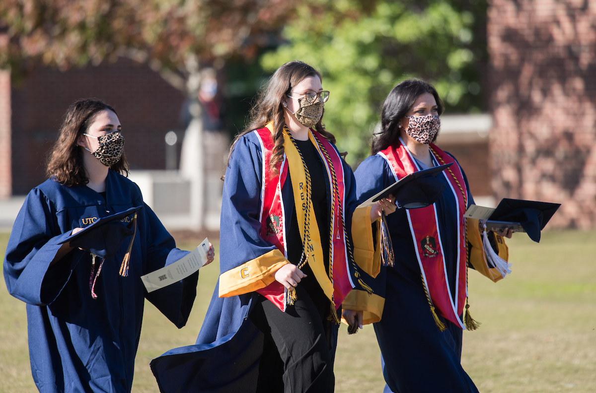 Undergraduate students participate in a commencement ceremony on Friday, Nov. 20, 2020 on Chamberlain Field.