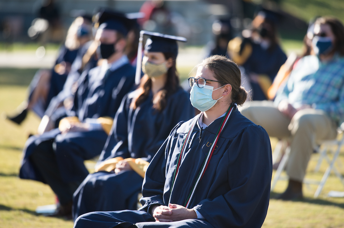 Undergraduate students participate in a commencement ceremony on Friday, Nov. 20, 2020 on Chamberlain Field.