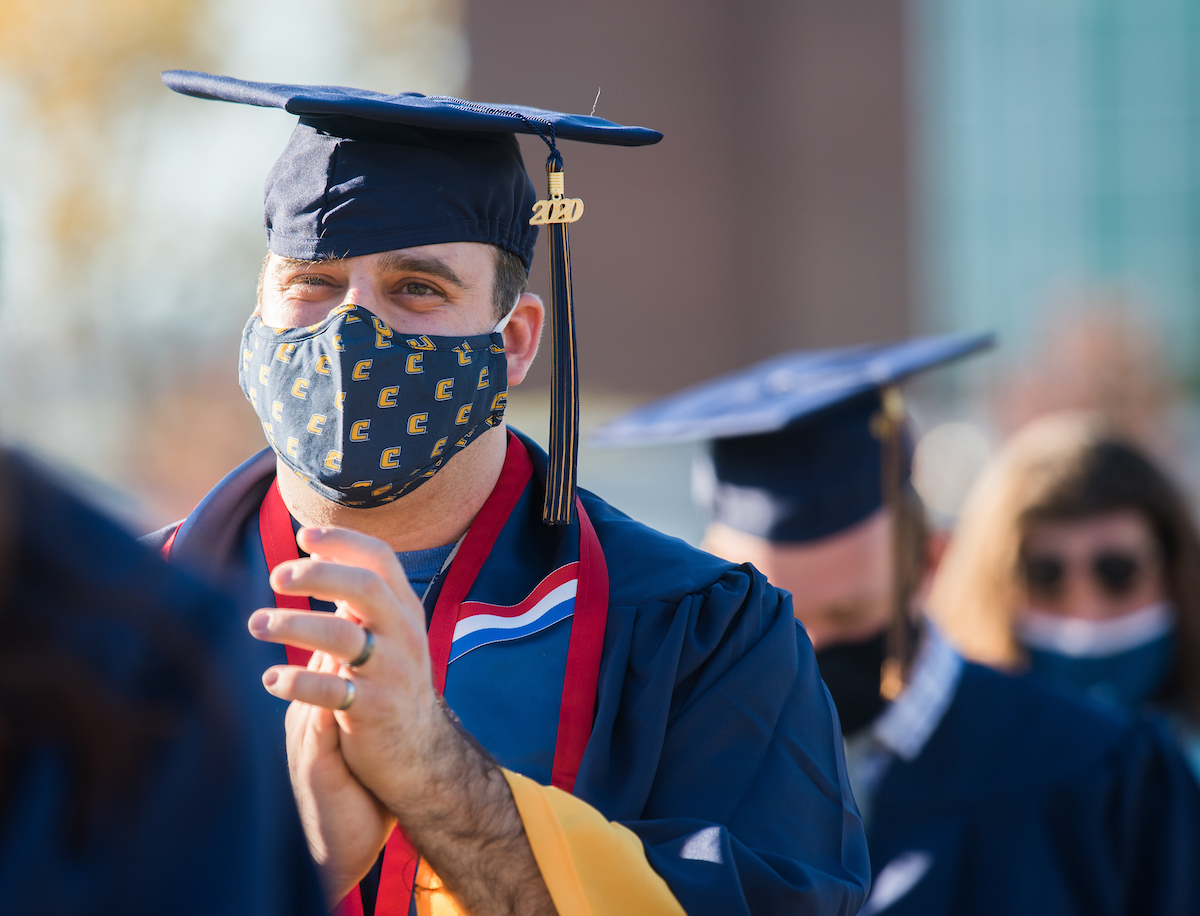 Undergraduate students participate in a commencement ceremony on Friday, Nov. 20, 2020 on Chamberlain Field.