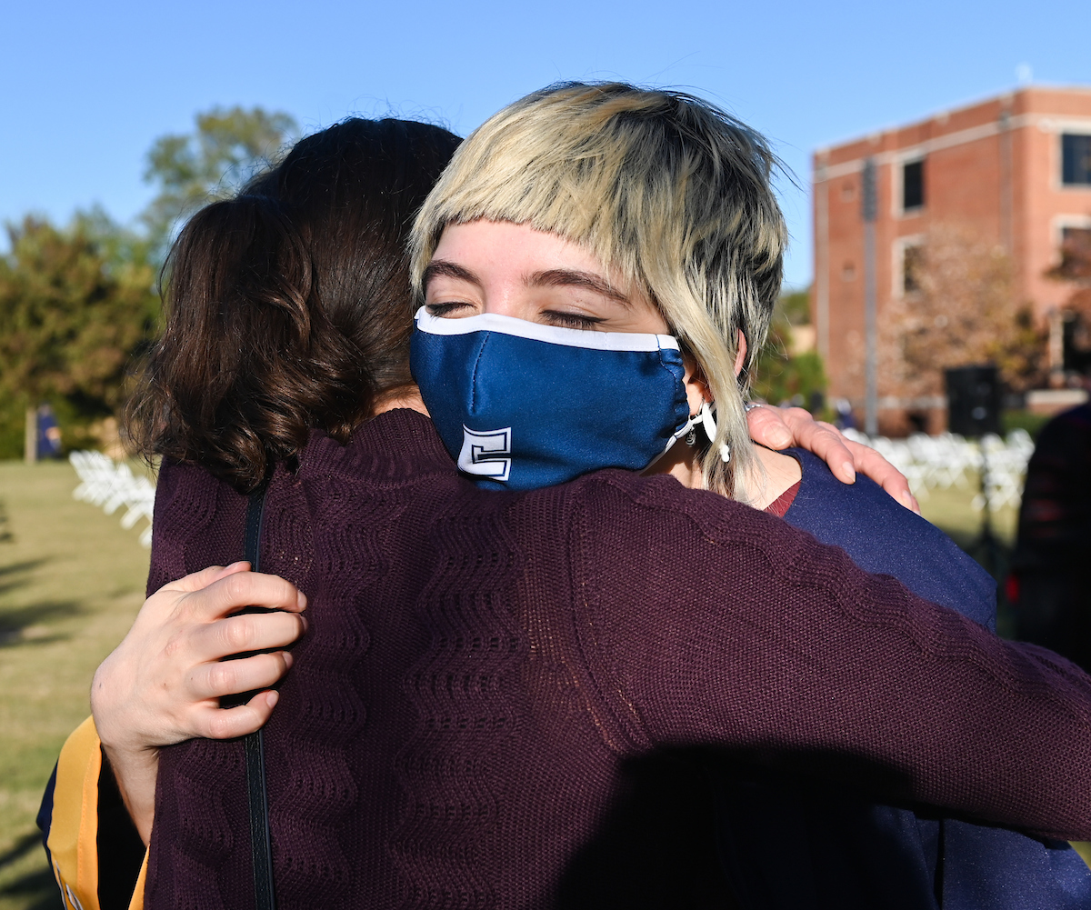 Undergraduate students participate in a commencement ceremony Friday, Nov. 20, 2020 on Chamberlain Field.