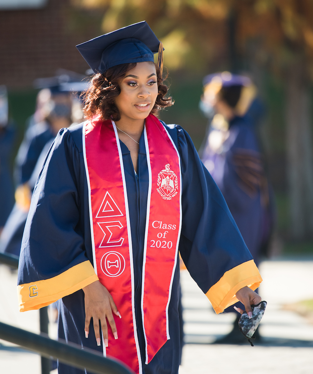 Undergraduate students participate in a commencement ceremony Saturday, Nov. 21, 2020 on Chamberlain Field.