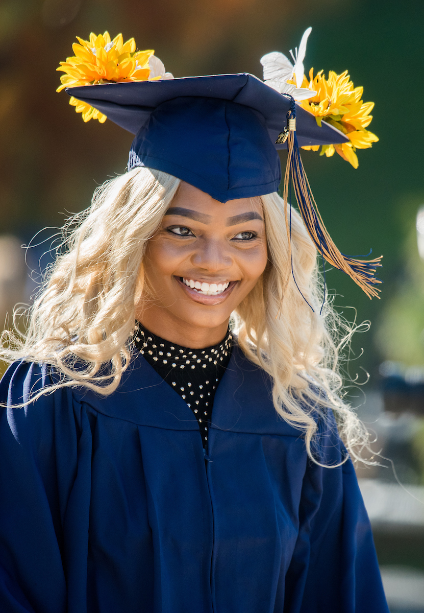 Undergraduate students participate in a commencement ceremony Saturday, Nov. 21, 2020 on Chamberlain Field.