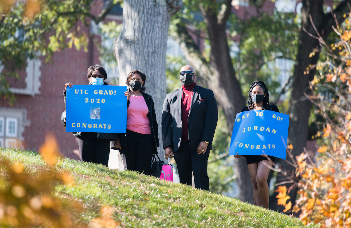 Undergraduate students participate in a commencement ceremony Saturday, Nov. 21, 2020 on Chamberlain Field.