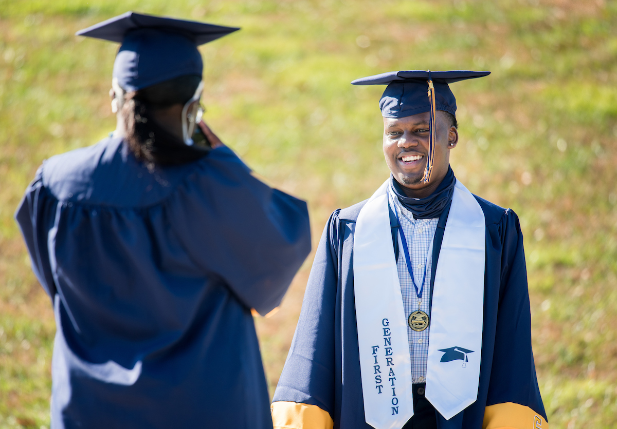 Undergraduate students participate in a commencement ceremony Friday, Nov. 20, 2020 on Chamberlain Field.