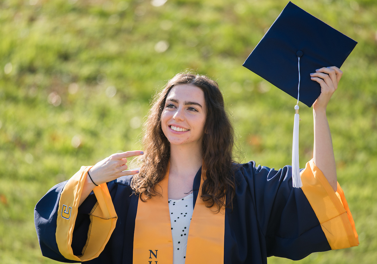 Undergraduate students participate in a commencement ceremony Friday, Nov. 20, 2020 on Chamberlain Field.