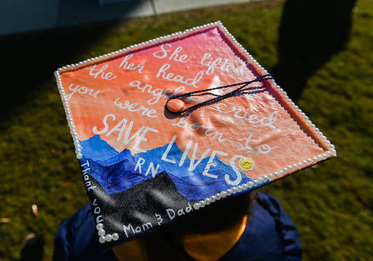 Undergraduate students participate in a commencement ceremony Saturday, Nov. 21, 2020 on Chamberlain Field.