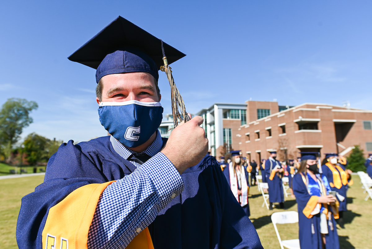 Undergraduate students participate in a commencement ceremony Saturday, Nov. 21, 2020 on Chamberlain Field.