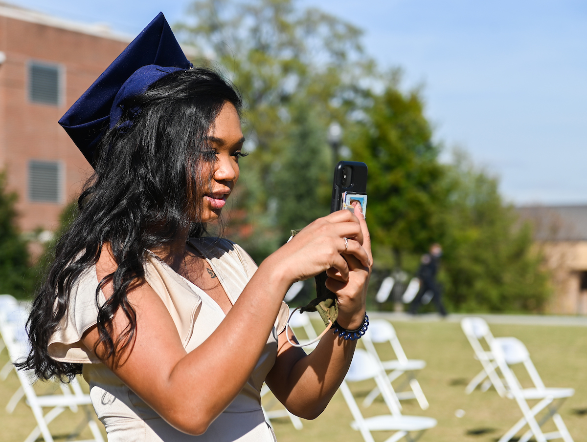 Undergraduate students participate in a commencement ceremony Friday, Nov. 20, 2020 on Chamberlain Field.