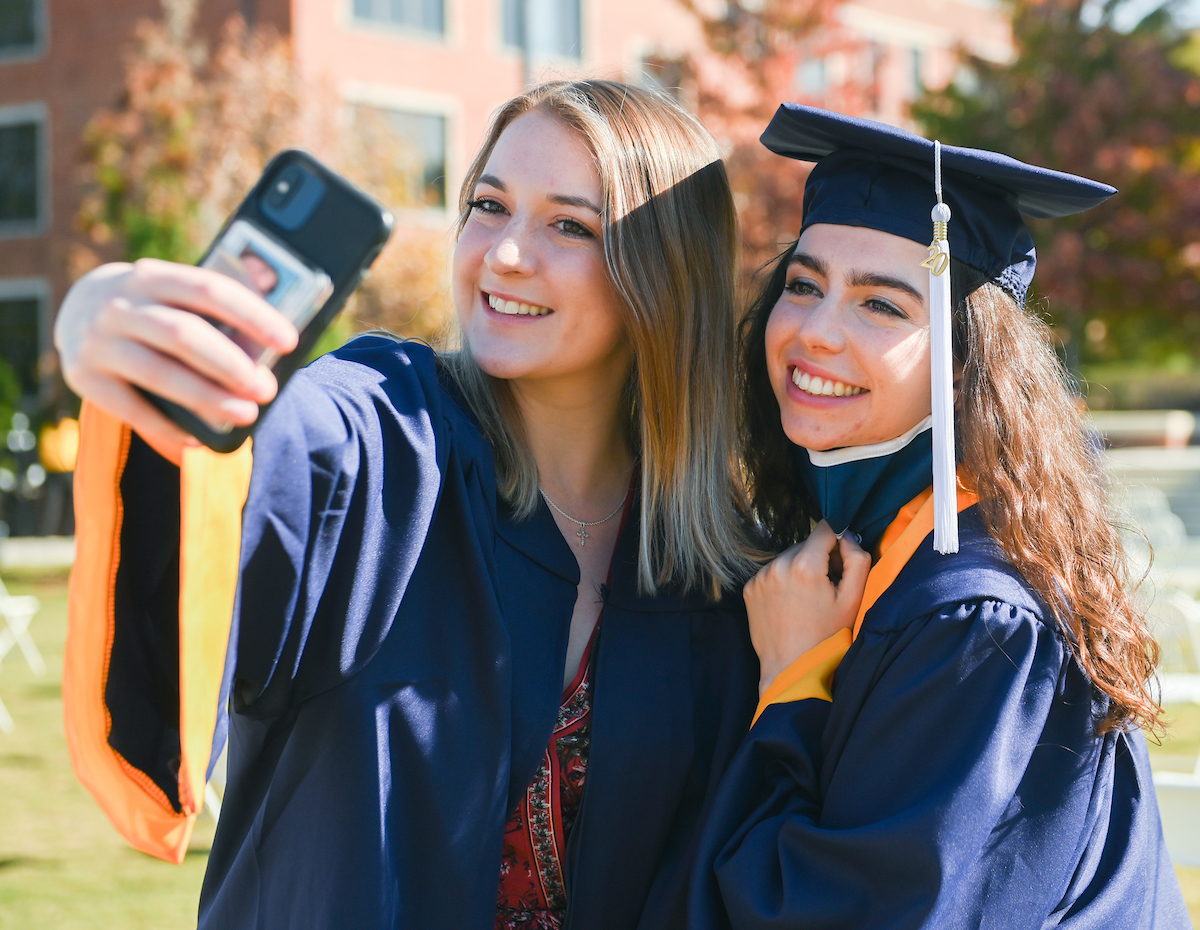 Undergraduate students participate in a commencement ceremony Friday, Nov. 20, 2020 on Chamberlain Field.