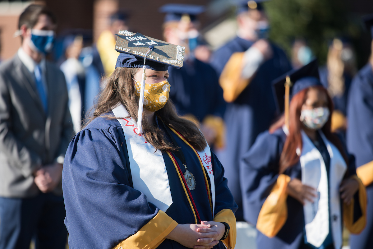 Undergraduate students participate in a commencement ceremony Saturday, Nov. 21, 2020 on Chamberlain Field.