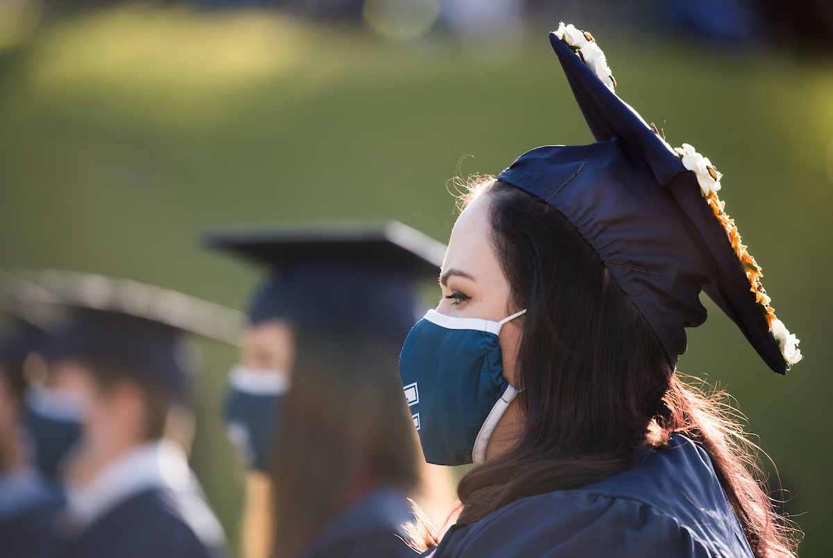 Undergraduate students participate in a commencement ceremony Saturday, Nov. 21, 2020 on Chamberlain Field.
