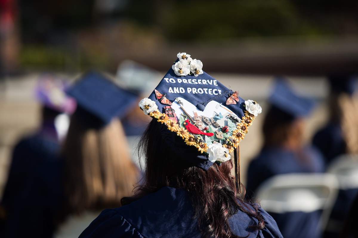 Undergraduate students participate in a commencement ceremony Saturday, Nov. 21, 2020 on Chamberlain Field.